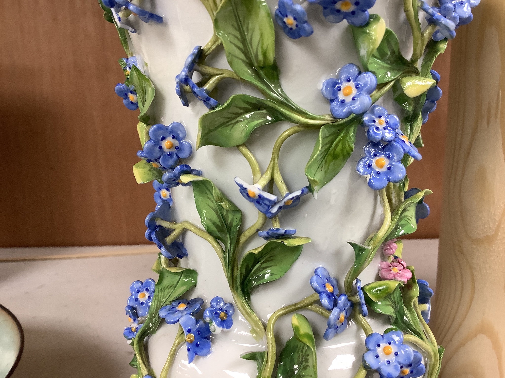 Two similar 19th century Meissen pot pourri vases and one cover, tallest 20cm